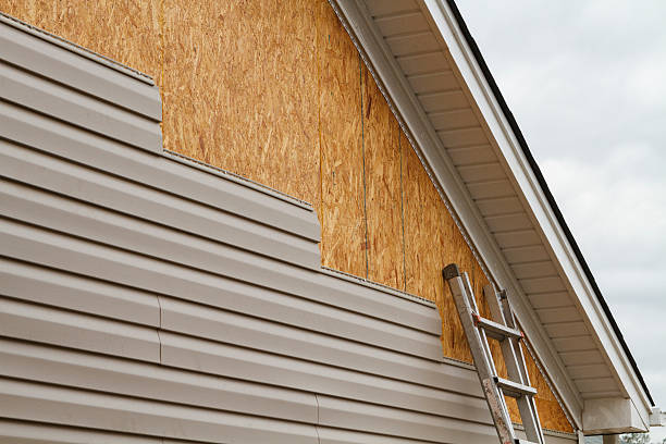 Professional Vinyl Siding technician working in Dalton, PA